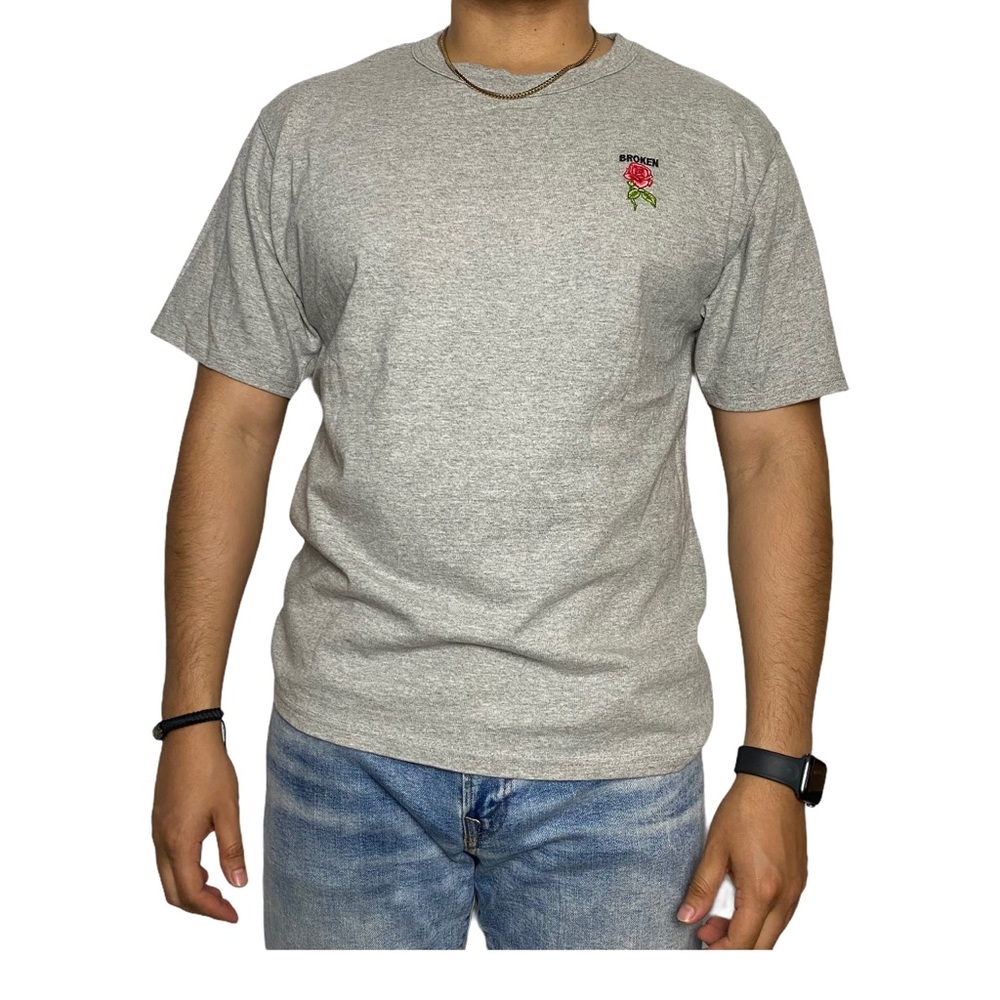 Champion with embroidered rose and broken shirt